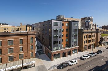 An aerial view of a building in the city at Kesler Apartments in Downtown Fargo, Fargo, ND 58102
